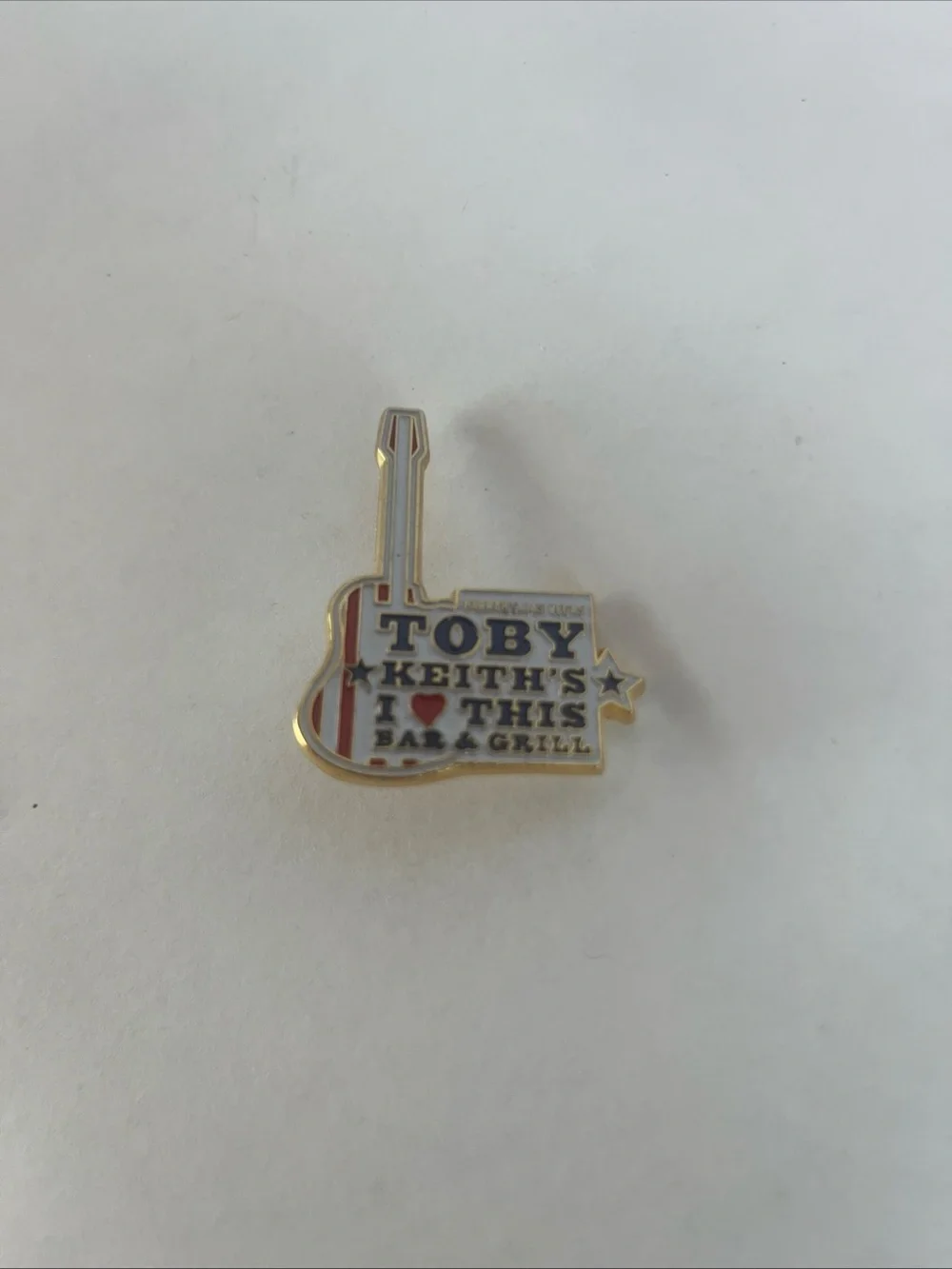 Toby Keith's Bar & Grill Guitar Enamel Pin - White, Red, Blue